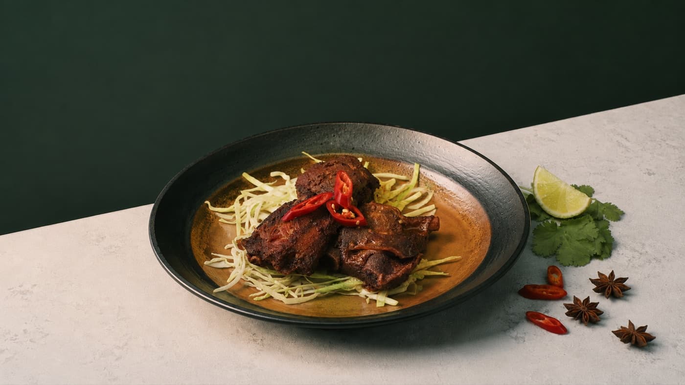 Five spice honey ribs served at Pho District