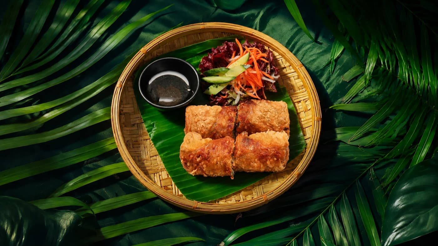 Crispy imperial spring rolls with fresh herbs